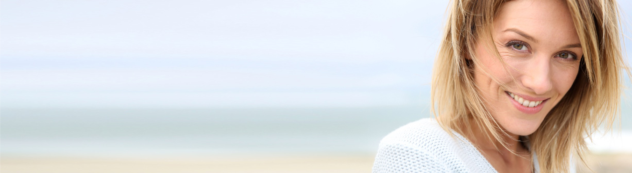 Woman smiling at beach